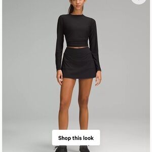 NWOT Black Pace Rival Mid-Rise Skirt
Long